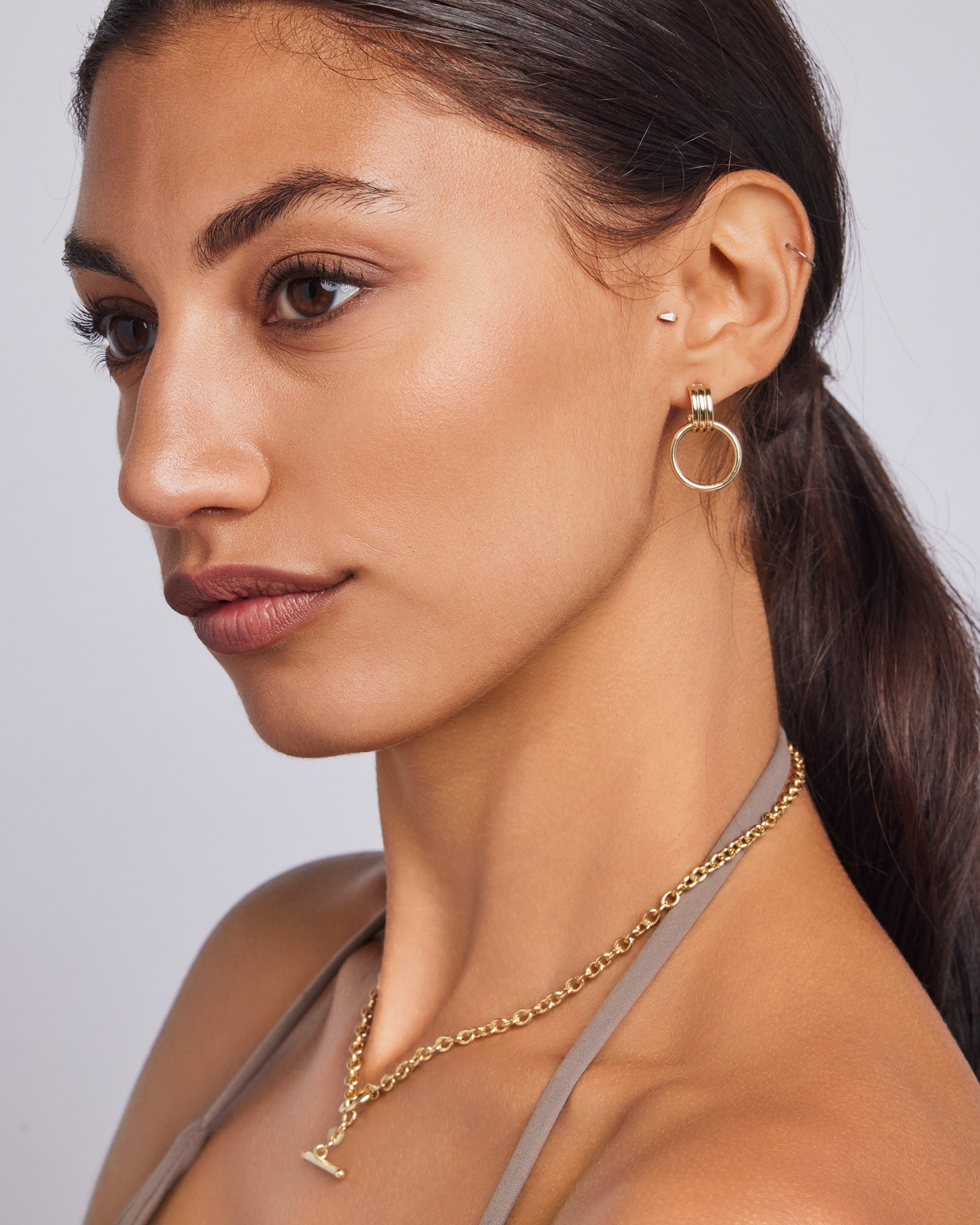 Glow 9K Gold Circle Drop Stud Earrings, close-up detail — Zoe Olivia
