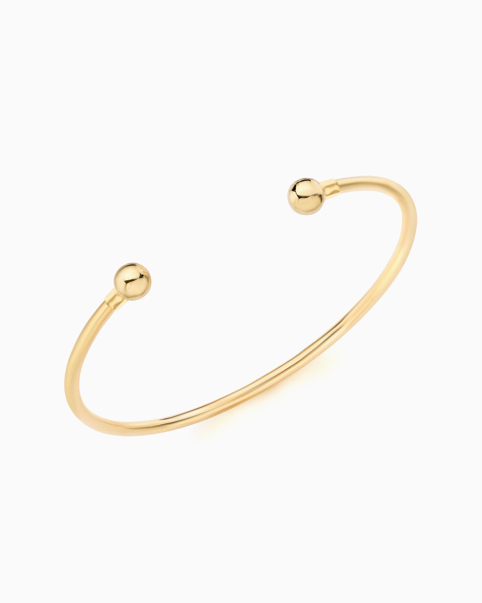 Linea 9K Gold Torque Bangle