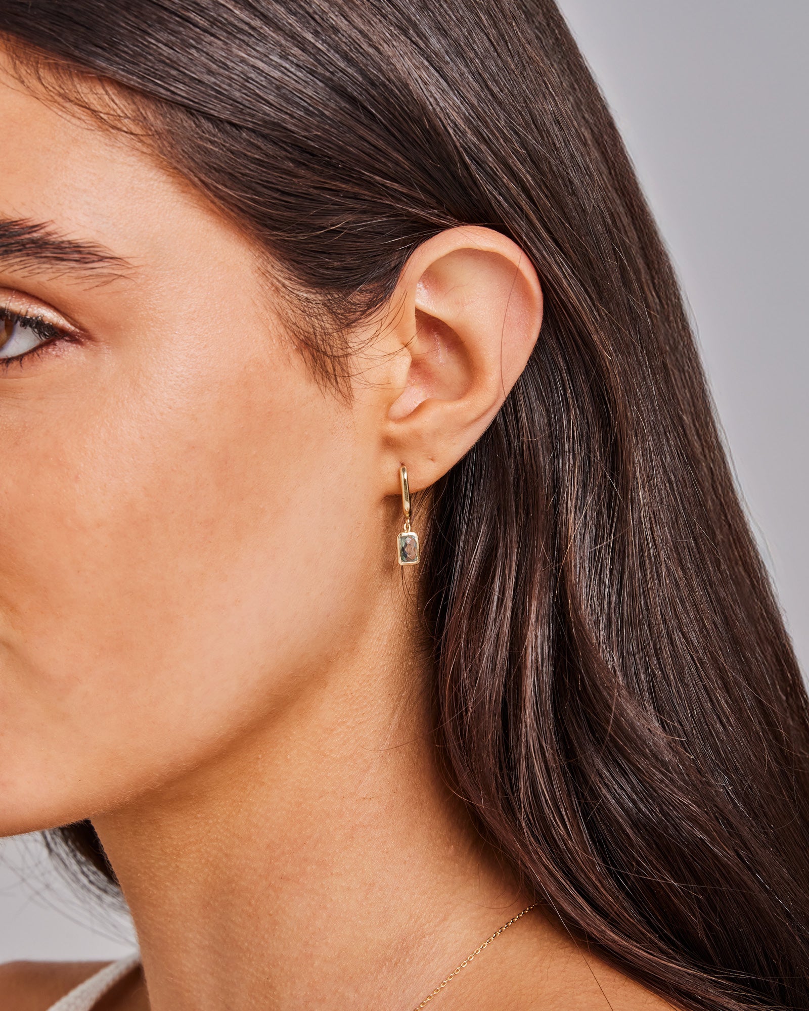 Essentials 9K Gold Faceted Sky Blue Topaz Huggie Earrings